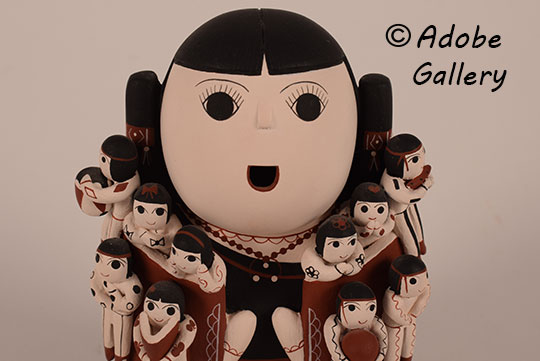 Close up view of the face of this figurine. Close up view of the face of this figurine.