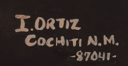 Artist signature of Juanita Inez Ortiz (1960-2008) Mapuwana ("Wild Rose") Cochiti Pueblo