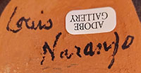 Artist signature of Louis Naranjo (1932 - 1997) was born at Cochiti Pueblo