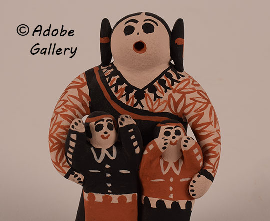 Close up view of the face of this Katsina Doll.