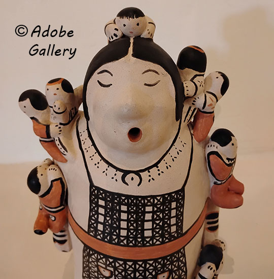 Close up view of the face of this figurine. Close up view of the face of this figurine.