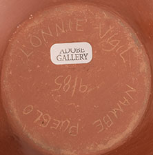 Artist signature of Lonnie Vigil (1949- ) Namb&eacute; Pueblo