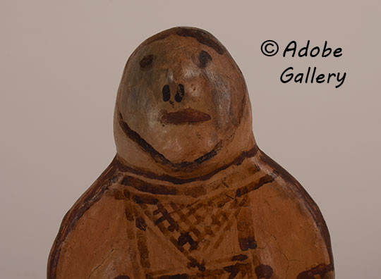 Close up view of the face of this figurine. Close up view of the face of this figurine.