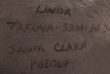 Artist signature of Linda Tafoya-Sanchez (1962 - )  Santa Clara Pueblo