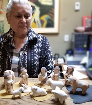 Stella Teller, Isleta Pueblo Potter, at Adobe Gallery.